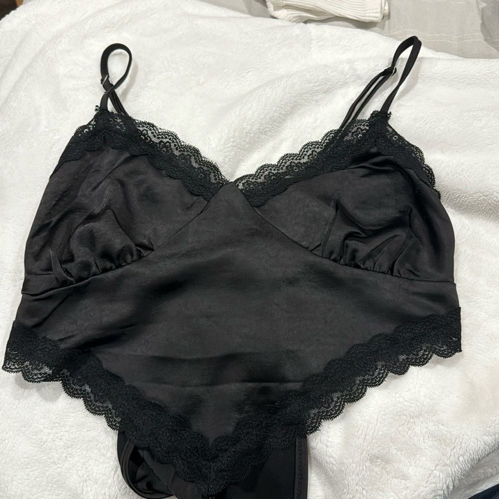 Black lace tank top. Wrap around tie.